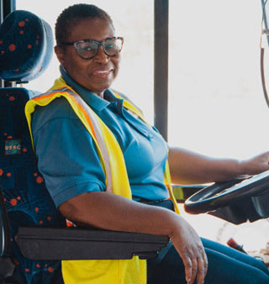 Woman working as a bus driver.